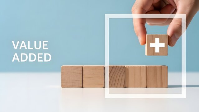 Hand adding wooden block with plus sign to row value added