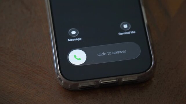 An incoming call on a mobile phone. Pick up or reject a call on your smartphone