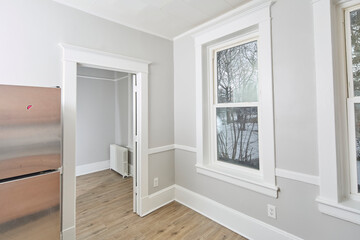 Fototapeta premium Empty apartment interior painted grey with pretty woodwork