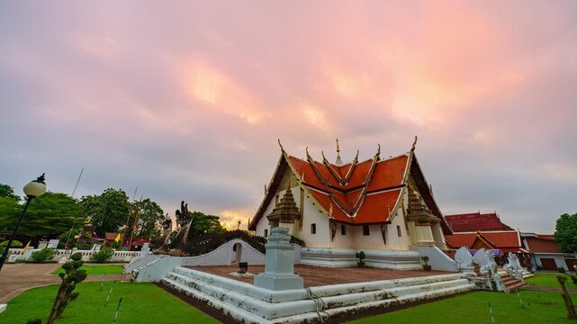 Historic Wat Phumin temple showcases traditional Lanna wall paintings known as Hub Taem, depicting ancient northern Thai life and culture. The renowned Whispering Lovers mural is a symbol of Nan