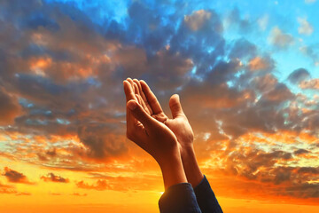 Muslim man hand praying at sunset, eid adha mubarak concept