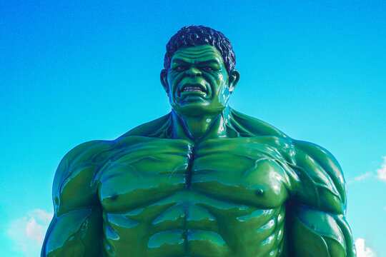 a hulk statue at the traditional market of Tangga Arung, Tenggarong with blue sky