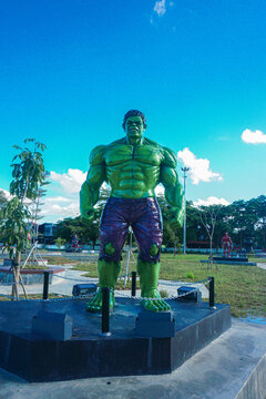 a hulk statue at the traditional market of Tangga Arung, Tenggarong with blue sky