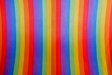 Vibrant abstract rainbow cloth texture. Colorful pride background