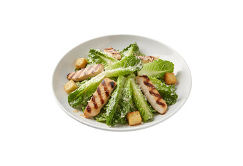 Caesar salad displayed on a white background. Healthy cuisine