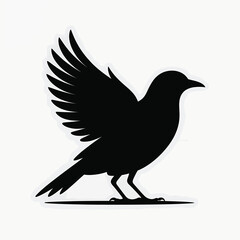 Fototapeta premium Black bird silhouette with wings spread on white background