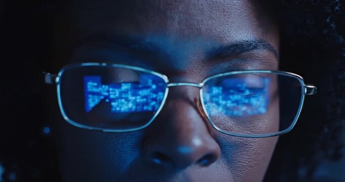 Woman wearing glasses with code.