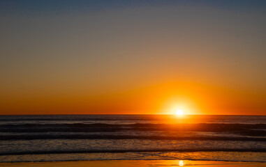 Sunset over pacific ocean © Becky