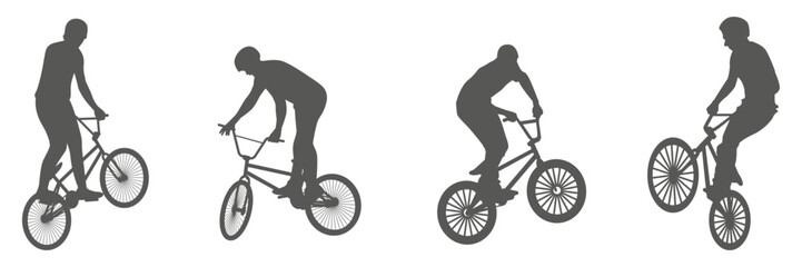 Fototapeta premium Cyclist silhouettes riding road bikes in dynamic action poses