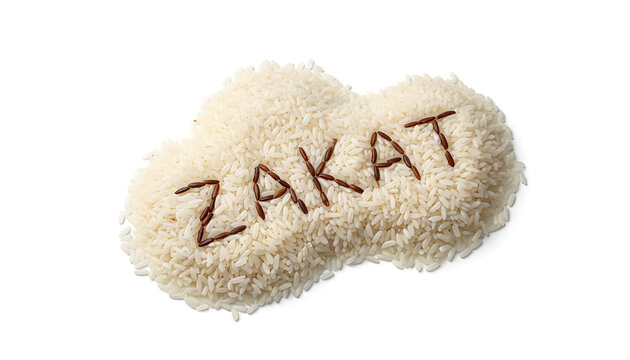 Zakat Concept with the Word Zakat Written in Brown Rice on a Pile of White Rice