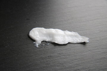 white cream on a black 