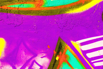 Naklejka premium Purple graffiti street art with yellow, aqua, orange paint on cracked wall. Urban 90s, Y2K style, grungy texture, vibrant colors. Posters, backgrounds, digital art, social media, creative banner.