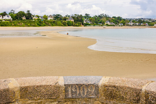 View from a pier at a sandy beach in Morgat a coastal village in bretagne