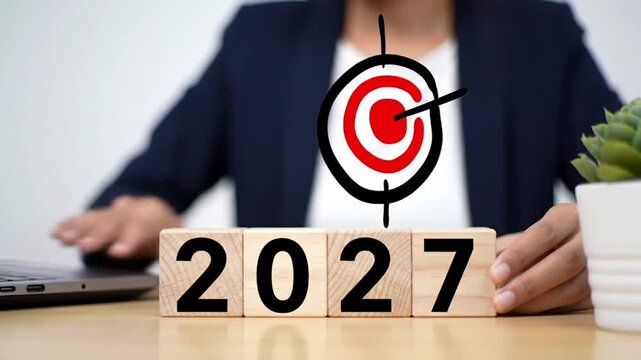 Businesswoman Places Target On 2027 Blocks, Strategic Planning, Forward Thinking, Stock Media