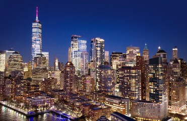 Obraz premium Manhattan skyline. New York City wide panoramic skyline. New York cityscape along the waterfront. NYC aerial skyline above downtown Manhattan. New York City landscape with skyscrapers.
