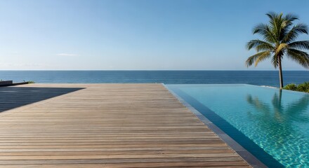 Fototapeta premium Infinity Pool with Wooden Deck Overlooking Tropical Ocean