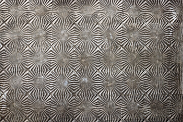 Vintage metal texture with geometric embossed pattern
