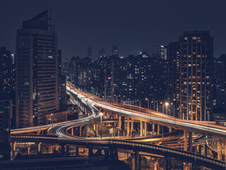 Obraz premium Night View of Luban Road Overpass and Urban Skyline, Shanghai, China