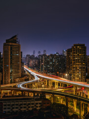 Obraz premium Night View of Luban Road Overpass and Urban Skyline, Shanghai, China