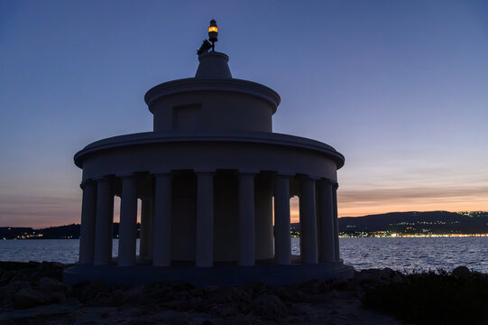 Wide Dusk View of the Fanari Lighthouse and Argostoli Lights, Kefalonia, Greece