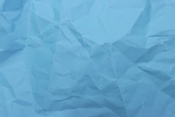 Obraz premium Wrinkled blue craft paper pattern background