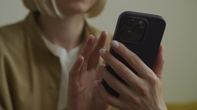 Woman Using Smartphone at Home Close Up Scene