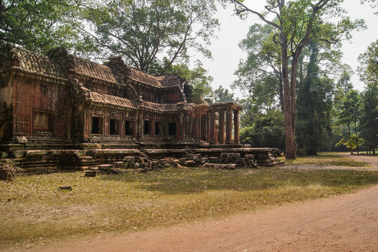 Road and building on Angkor Wat grounds with trees, Cambodia
