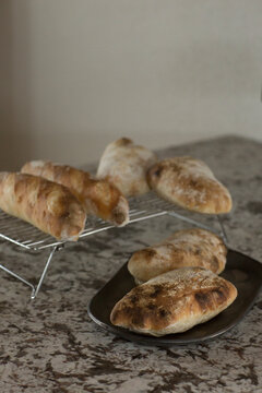 Homemade Flatbread Cooling on a Granite Countertop