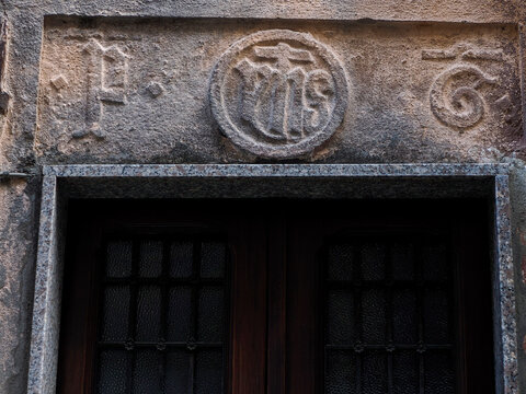 old bas relief detail in finalborgo medieval village in liguria italy