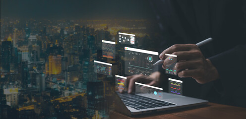 Analyst manages the system database, AI analysis data plans, and reports. shows a dashboard chart on the computer. research on digital platform technology. ai analytics business concept