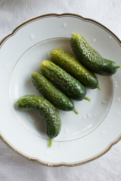 Top view of fermented gherkins on a plate