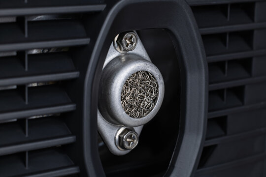 generator exhaust pipe, spark arrestor close-up