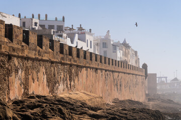 Essaouira, Morocco: The famous ancient fortified walls of the Mogador old town in Essaouira in Morocco on a sunny winter day