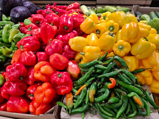Market stalls are filled with ripe fruits and seasonal vegetables