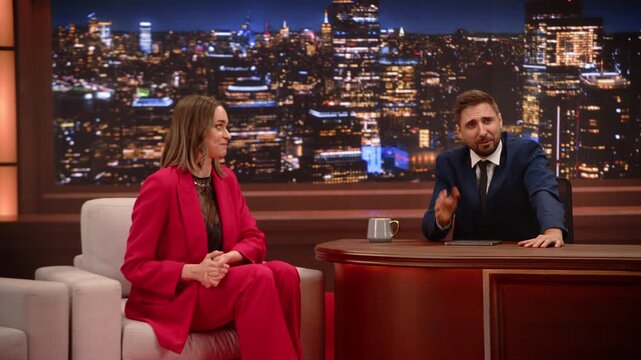 Male Late Night Host Interviews a Female Guest, Chat Fun Gossip, Jokes, Career Talk. Their Friendly Talk, Positive Lively Performance for Viewers. Mockup Playback Television Studio