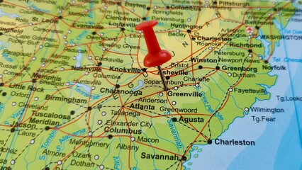 View of Greenville, is a city in Greenville County, South Carolina, United States, on a geographical map of America, marked with a red push pin.
