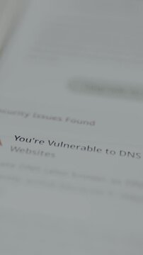 Alert message about the vulnerability of the mobile phone to DNS hijacking after the performed device scan, cybersecurity concept