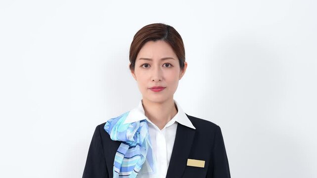 お辞儀する女性店員・受付スタッフ