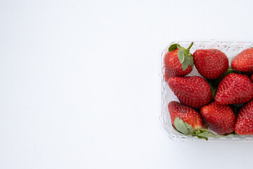 Fresh juicy strawberries close-up macro background showcasing vibrant red color, glossy surface, and rich natural texture. Extreme close-up highlighting ripeness, freshness, and appetizing detail. Con