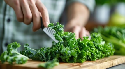Close-up of kale being chopped, emphasizing the intricate leaf patterns and freshness on a rustic wooden cutting board.