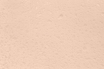 Uniform paint droplets macro soft peach pastel background