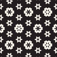 Luminous white celestial blossoms dancing across a midnight black canvas.