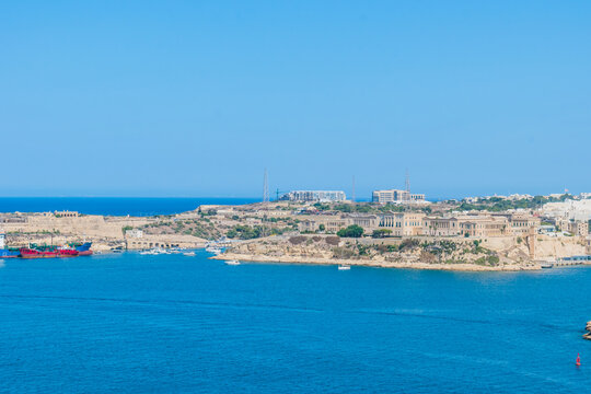 Coastline of Kalkara with Villa Bighi at top seen from Valletta and Grand Harbour, MALTA