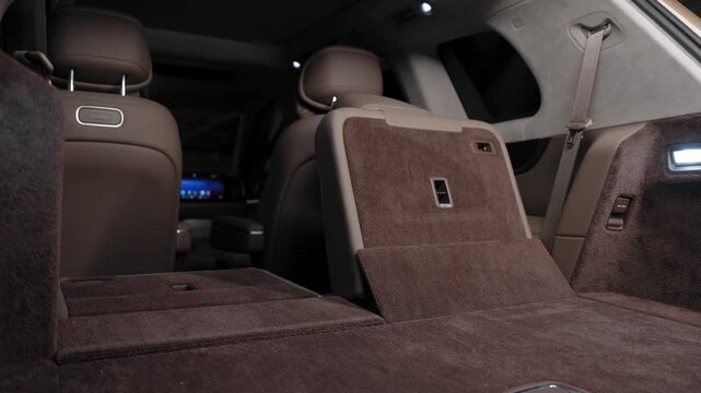 The rear seat of the car folds down. 