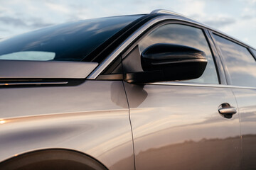 Obraz premium A family, youth and modern urban crossover with a two-tone paint job, beautiful wheels and a large chrome radiator grille.