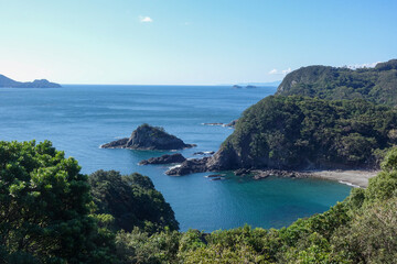Secluded rocky islet and turquoise bay along Shikoku Henro coastal pilgrimage Japan © Benedikt