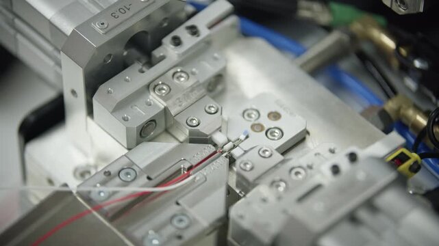 Automated unit assembling loaded temperature sensor components