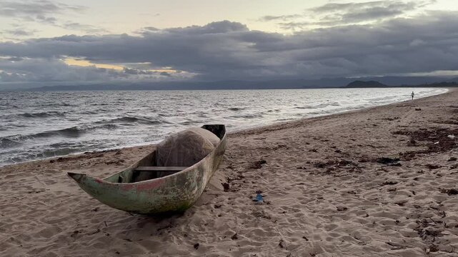 Traditional Malagasy boat on the beach in Maroantsetra, Madagascar.