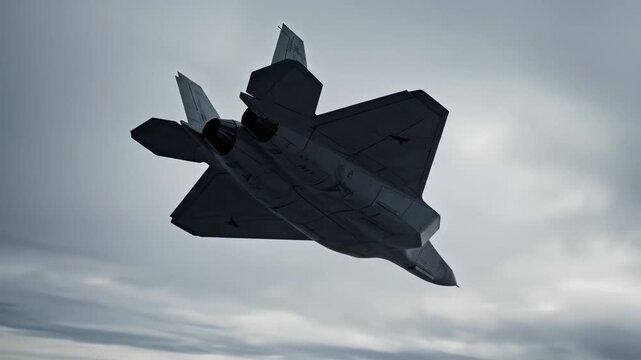 Stealth fighter jet flying in clouds