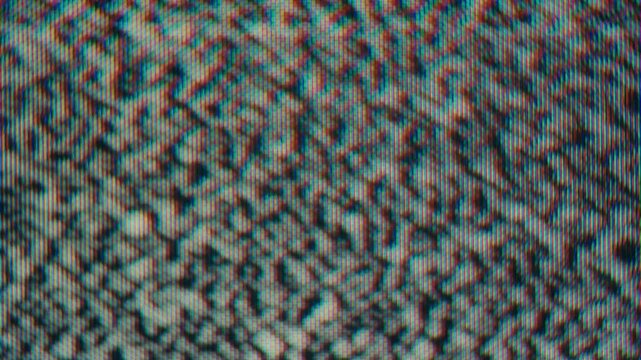 Vintage media screen with SRT overlay and television noise toggle effect.